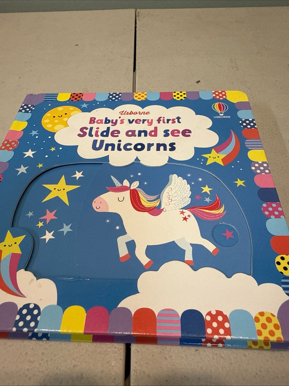 Usborne Baby’s Very First Slide and See: Unicorns – Board Book (Interactive)